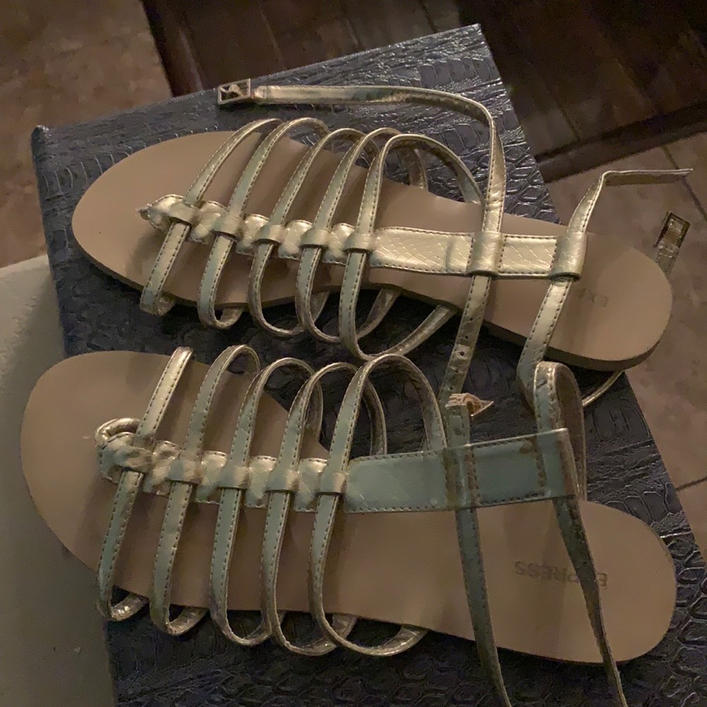 Gold sandals worn twice